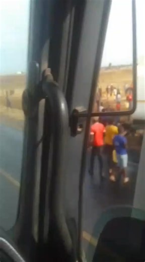 ACCIDENT ALERT🚨 An accident involving a petroleum tanker and a cargo truck has occurred at Maili Tisa, Eldoret, along the Eldoret–Malaba Highway. Residents are seen attempting to siphon fuel from the tanker. | Long Distance Drivers and Conductors Association of Kenya
