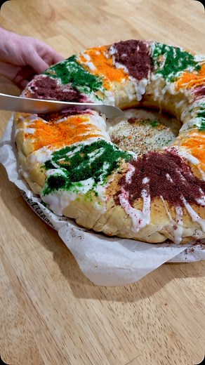 We look forward to mom’s King Cake all year! Cream Cheese Filled King Cake (Baked in Cast Iron Skillet) Ingredients: For the Dough: 1/2 cup warm milk (about 110°F) 1/4 cup granulated sugar 2 1/4 teaspoons active dry yeast (1 packet) 1/2 cup butter, softened 1/2 cup cream cheese, softened 3 large eggs 1 teaspoon vanilla extract 1/2 teaspoon salt 4 cups all-purpose flour (plus extra for dusting) 2 pecans or plastic baby For the Cream Cheese Filling: 8 oz cream cheese, softened 1/4 cup powdered sug
