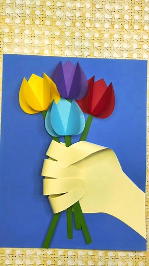2.8M views · 79K reactions | Easy Spring Paper Craft Tulip For Kids. Art project to make when you are feeling bored. Create a sentimental handprint card for moms, dads and grandparents with a glue stick, scissors and construction paper. Kids will love crafting this fun and easy craft. This is a fun art activity for little kids to make at school or a spring inspired party! | Timm Sevitz | Facebook
