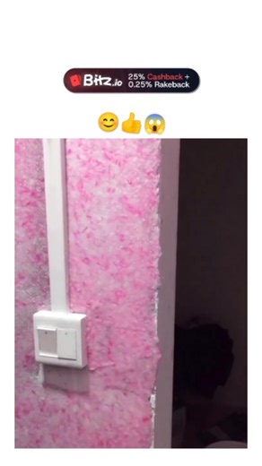 PixelMind_25 on Instagram: "This X post shares a 14-second DIY video demonstrating wall texturing around electrical outlets using pink and red granular materials for a seamless, vibrant finish, likely appealing to home renovation enthusiasts. Posted by @somodam , a creator focused on cute and aesthetic content, the video has exploded in popularity with over 495,000 views, 310 likes, and 176 replies in under 24 hours, suggesting strong resonance in visual craft communities. User reactions blend p
