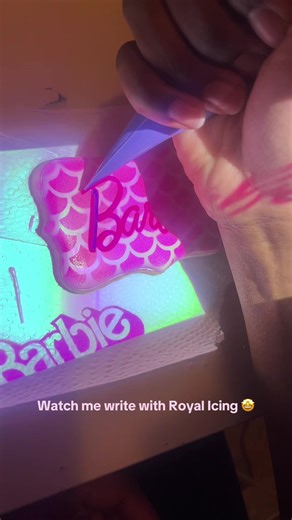 My Kodak Projector always helps me to achieve perfect fonts for a variety of cookie designs. Writing with royal icing can be hard, but projectors help ALOT.