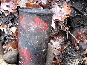 Digging old beer cans from a Virginia dump
