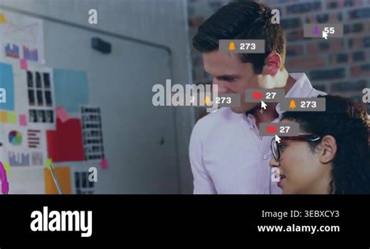 Pair reviewing laptop, discussion causing social media counters rising, obscuring screen, fading. Computer, collaboration, vibrant, design, office, brainstorming, analytics Stock Video Footage - Alamy