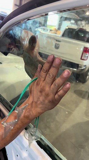 Car Window Repair Techniques in an Automotive Workshop