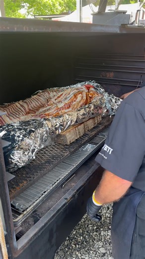 BBQ Warriors hog heading to the smoker Myron Mixon Smokers Snake River Farms Myron Mixon BBQ - Gatlinburg Purina Miller Lite THOR Industries, Inc. Keystone RV Freedom Trailers | Myron Mixon