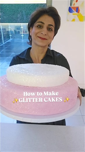 Sugared by Shahana on Instagram: "SAVE tips 🎯 How to make GLITTER CAKES!! 1️⃣ roll out the fondant to the required size and cover the cake 2️⃣ for super sharp edges use @sharpedgesmoother (I wanted rounded edges for this design) 3️⃣ leave the fondant to dry for about 30 mins 4️⃣ Thinly brush the sides and top of the cake with PME piping gel 5️⃣ sprinkle Magic Sparkles edible glitter liberally over the top and use a flexible smoother to drag glitter up the sides of the cake. Check for full cover