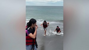 Inflatable dragon ride capsizes when it hits unexpectedly large wave