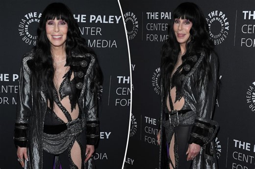 Cher dresses on theme in sheer catsuit with leather jacket at 'Bob Mackie: Naked Illusion' premiere