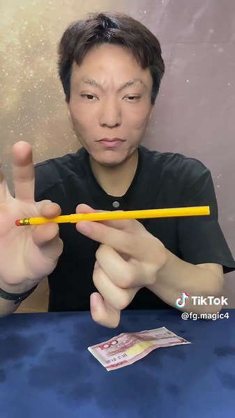 Pen Through Banknote Magic Trick