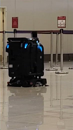 ahmedabad airport automatic floor cleaner. automation & AI working on top mode.
