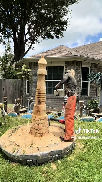 New lighthouse I carved from a dead oak stump#artist #art #stihl #chainsaw #foryourpage #sculpture #paint #fyp #stihlchainsaw #texas #carving #carving #texasartist #woodwork #wood #foryou #cute #woodcarving #titok #lighthouse