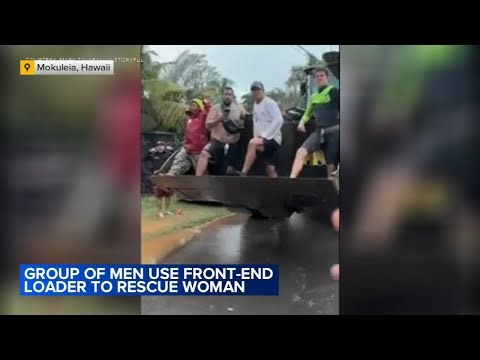 Group of men use front-end loader to rescue woman from Hawaii floods