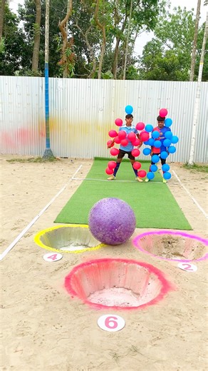 Challenge to pop balloons by throwing a big ball into a hole and picking up numbers!! | Tarzan Game