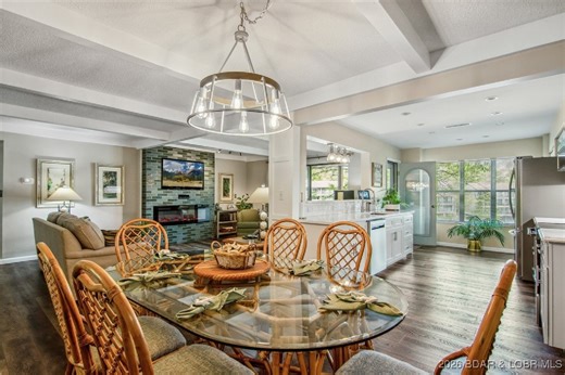 NEW LISTING: 320 Waters Edge Drive Unit 2A Lake Ozark, MO 65049 The location at Water's Edge everyone wants. A walk in unit with no steps from parking to the front door, plenty of parking even on the busiest of weekends. If you know Waters Edge you know this is a golf cart friendly community. With this unit you walk out of your condo to the golf cart parking, no long walks up or down hills! Great complex with beautiful grounds, community pool, clubhouse, playground, tennis courts, exercise area,