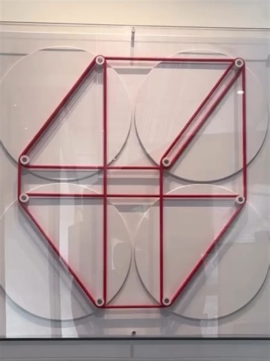 American artist, designer and engineer Chuck Hoberman creates kinetic structures that transform through geometry and mechanical movement. His work sits at the intersection of art, mathematics, architecture and engineering. In Nested Loops, created for the Museum of Mathematics (MoMath) in New York, a network of articulated geometric elements continuously expands, contracts and changes configuration. The sculpture is built from interconnected rigid pieces and rotating joints. As one section moves
