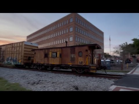 CSX Train with a Caboose Leading in Lakeland, Florida