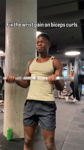 Lucky Physique on Instagram: "Wrist pain fix When doing biceps curls with a barbell or EZ bar, shift your wrist position forward to alleviate the strain."