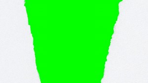 Realistic paper tear revealing green screen for editing