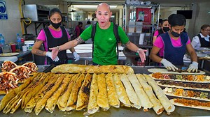 Cheesy Mexican street food in Mexico City - giant quesadilla machetes + street food tour of CDMX!