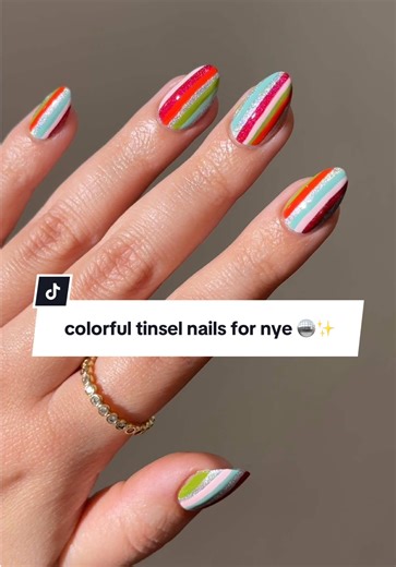 colorful tinsel nails for nye 🪩✨ products used: leave space for cake, candy girl, thats the ticket!, everlasting gobstopper, princeling, eat my shorts, aries, detail brush, and totally gelly. #newyearnails #tinsel #diynails #nailinspo #easynails