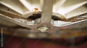 Washing laundry machine drum bearing leaking with rust and scale malfunction of internal part. Repair works needed. Maintenance shop video