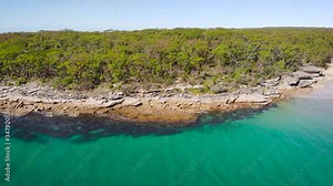 Jervis Bay in Australia. Scenic rocky shore and clear ocean water.