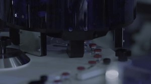 real shot of injection vial filling production line in a biopharmaceutical factory