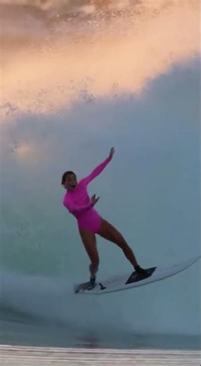 Dolphin Does Perfect Backflip Behind Surfer!