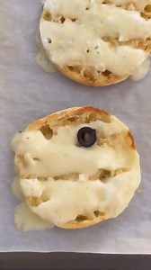 🧟 Sink your teeth into this spooky Halloween garlic bread! Made to look like a mummy for a hauntingly tasty treat! 🎃✨ Dinner just got way more festive! See how to make this super easy recipe at the link below! https://homemadeheather.com/halloween-garlic-bread-recipe/ | Homemade Heather