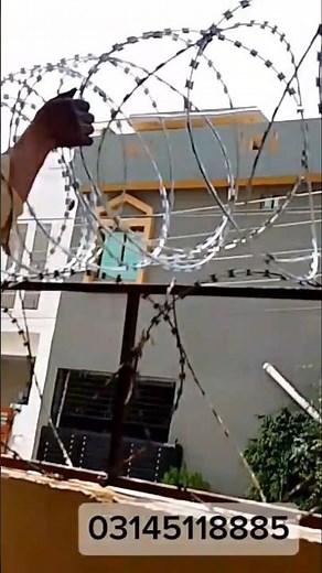installation of Concertina Razor Wire Chainlink Fence