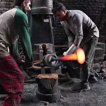 From Rust to Radiance: Forging a Wheel Axle from a Rusted Dozer Chain