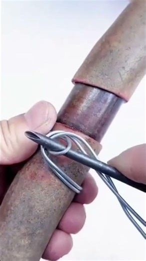 The process of tying PVC pipe joints using super strong wire #shorts