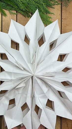 DIY Light-Up Paper Snowflakes. #dollartree #dollartreechristmas #dollartreechristmasdiy #dollartreediy #dollartreehacks #dollartreeprojects #dollartreefinds #christmas #christmas2022 #christmascrafts #christmasdiy #diychristmas #christmasiscoming #holidaycrafts #christmasdecor #christmasdecorating #christmasdecorations #snowflake #snowflakes #papersnowflakes #papercrafts #papercrafting #papercraft #learnontiktok