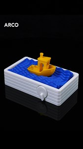 🚤 It Moves?! It Floats?! Guess What This Benchy Can REALLY Do… 👀​ ​ B2Builds - Ben Brandt 's Benchy Wave Machine Automaton transforms the iconic Benchy into a floating spectacle of motion and color.​ ​ With a simple twist, stylized waves ripple beneath the hull, making this print as fun to play with as it is to watch.​ ​ Printed in vibrant PLA White, Blue, and Orange on the Phrozen Arco, it features snap-fit parts, minimal supports, and seamless motion, perfect for showing off your multicolor 