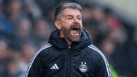Stephen Robinson reacts to St Mirren jeers as he gives Dons relegation verdict