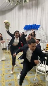 Woman catches the bride's bouquet, and her boyfriend takes off running!