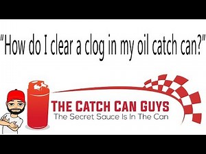 How do I clear a clog in my oil catch can?