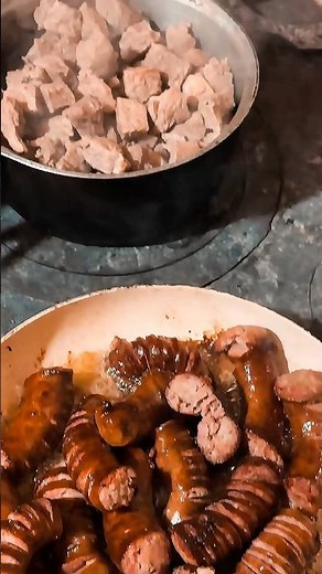 Sausages and meat pork roast cooked in a traditional stove 🥩