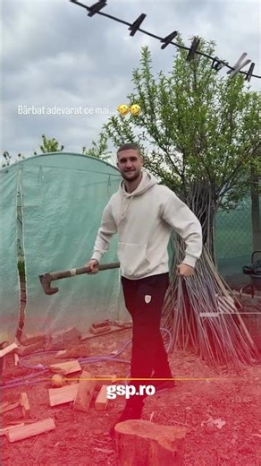 Daniel Bîrligea, caught chopping wood in his free time