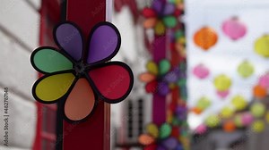 Fast rotate windmill with background of lantern at street