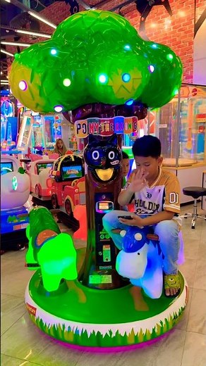 This adorable horse carousel will instantly make your day better! 🐴🎠😊🌳#carousel #cute #cutebaby