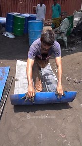 Transformation of Iron Drums into Scrap Sheets
