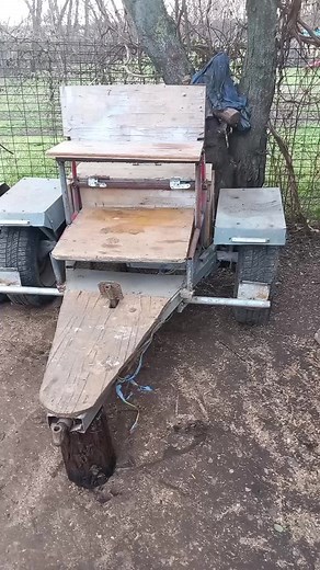 DIY Wooden Trailer Construction in Rural Setting