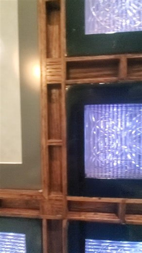 Voice overs are...cringe. But this piece is too awesome not to share. It's much better in person =). Come in and see for yourself. Our favorite customers Ted & Susan gifted us some of the Frank Lloyd Wright tiles a few years ago. Our friend Justin O'toole crafted this one of a kind wooden frame complete with lights to house the tiles and their skematic from the U.S. Patent Office. These tiles were the inspiration for our TOAST logo. We love the geometric pattern. They stood out the first time we