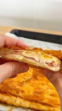 Easy puff pastry empanada filled with ham and cheese