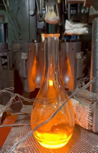 How Glass Bottles Are Formed From Molten Glass