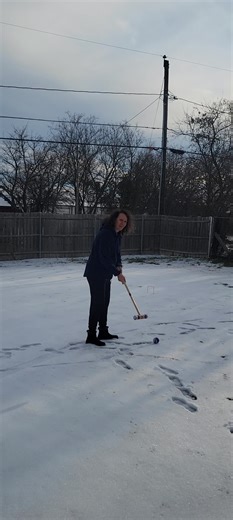 We have an inch of ice and about inch or less of snow on top, so of course,we had to play Snow Croquet! part 2 🤣🤣 I think this should become an Olympic sport. #croquet #babyitscold #dfwtiktok