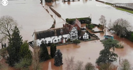 A couple's home in England kept flooding. So they built a wall to stop it.