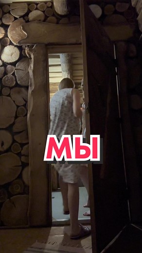 Mysterious Figure Opening Rustic Wooden Door