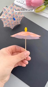 89K views · 776 reactions | ☂️ Craft a cute DIY paper umbrella for your next art project! Fun, easy, and perfect for decorating or as a creative kids' craft. ☂️ #juniorsartanddiy #DIYPaperUmbrella #PaperCrafts #EasyDIY #CraftIdeas #CreativeCrafts #KidsCrafts #ArtsAndCrafts #HandmadeDecor #DIYDecor #FunWithPaper #CraftingWithKids #DIYProjects #ArtProjects #CraftLovers | Juniors Art and DIY | Facebook